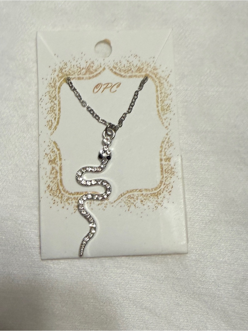 OP Silver Snake Pendant Necklace with Clear Stones